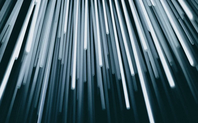 Streaks of light in the dark, like signals down a cable